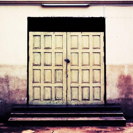 Wooden Door in old vintage retro styleの写真素材