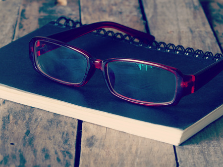 glasses and book retro-vintage styleの写真素材