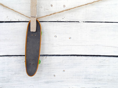 Skateboard on wood backgroundの写真素材