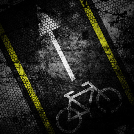Bicycle road sign grunge background textured on concrete wallの写真素材