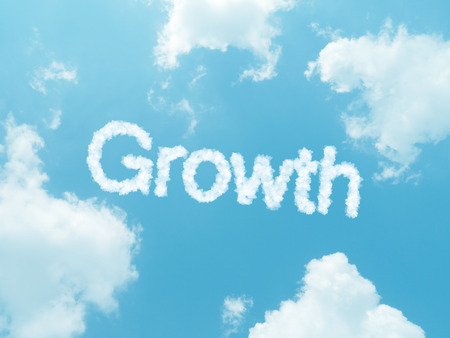 growth cloud word with design on blue sky backgroundの写真素材