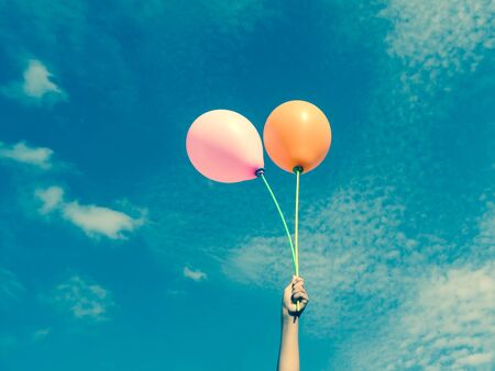 Balloons in the sky  with filter effect retro vintage styleの写真素材