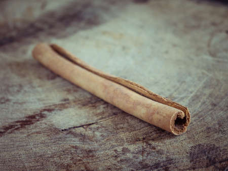 cinnamon sticks  on  wood backgroundの写真素材