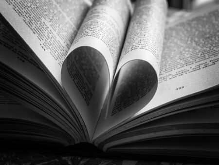 black and white  love heart in a bookの写真素材