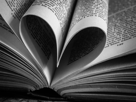 black and white  love heart in a bookの写真素材