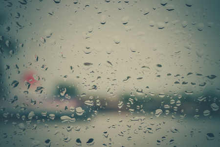 Drops of rain on glass with filter effect retro vintage style