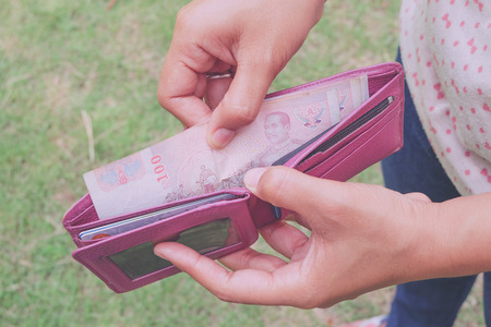 take money from the wallet with filter effect retro vintage style