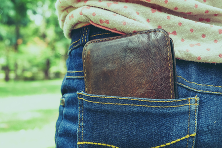 wallet in back pocket  with filter effect retro vintage styleの写真素材