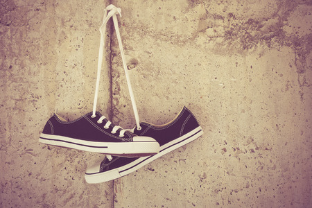 black sneakers with filter effect retro vintage styleの写真素材