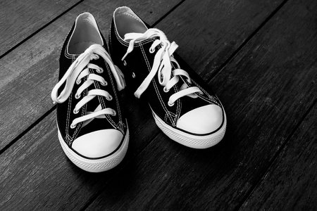 black sneakers with filter effect retro vintage styleの写真素材