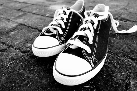 black sneakers with filter effect retro vintage styleの写真素材