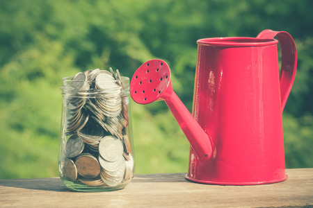 money in the glass with filter effect retro vintage styleの写真素材