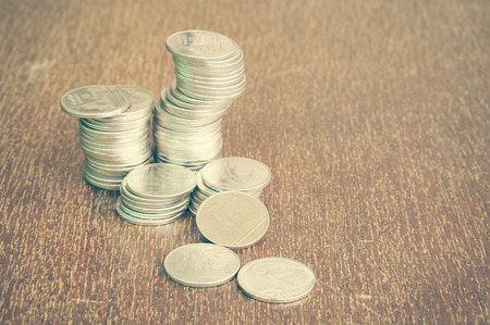Pen and coins with filter effect retro vintage style