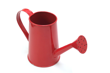 Red watering can isolated on white backgroundの写真素材