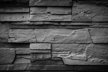 Black wall stone backgroundの写真素材