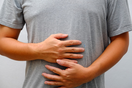 Man Suffering From Stomach Ache