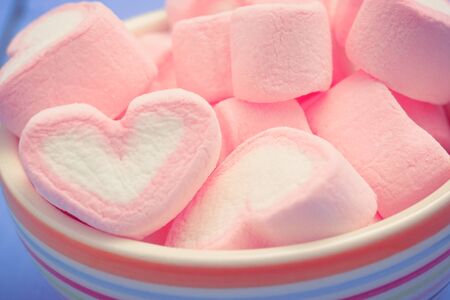 Pink heart shape of marshmallow with filter effect retro vintage styleの写真素材