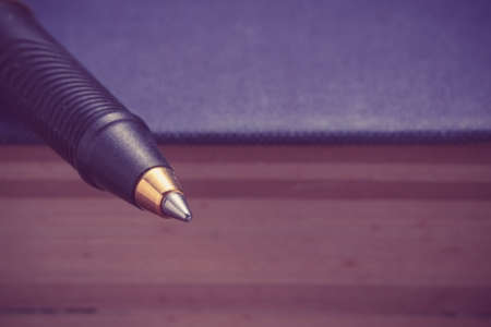 pen and book with filter effect retro vintage style