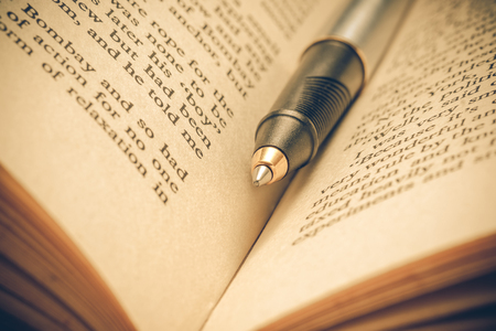 pen and book with filter effect retro vintage styleの写真素材