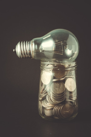 lamp and money with filter effect retro vintage styleの写真素材