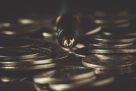 money concept coins and pen with filter effect retro vintage styleの写真素材