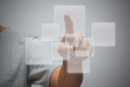 woman touch screen technology concep with filter effect retro vintage styleの写真素材