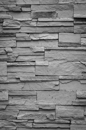 Black wall stone backgroundの写真素材