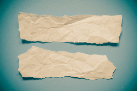 ripped pieces of paper with filter effect retro vintage styleの写真素材
