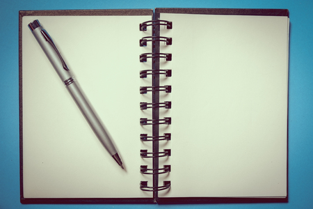 used blank note book with with filter effect retro vintage styleの写真素材
