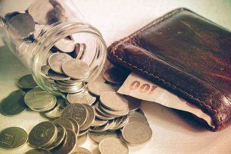 save money for investment concept money in the glass with filter effect retro vintage style