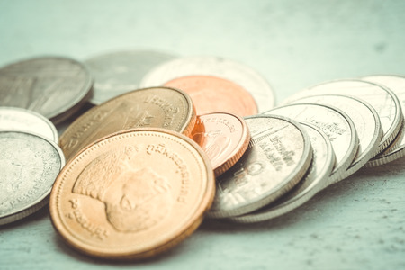 business finance. save money for investment concept coins with filter effect retro vintage styleの写真素材