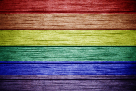 Rainbow 8 stripe flag pattern on dirty old concrete wall texture grunge backgroundの写真素材