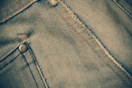 Texture of blue jeans background with filter effect retro vintage style