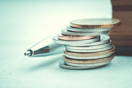 business finance. save money for investment concept coins with filter effect retro vintage style