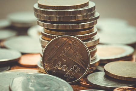business finance. save money for investment concept coins with filter effect retro vintage style