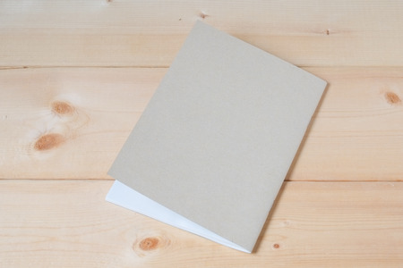 recycle notebook on wood background