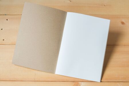 recycle notebook on wood backgroundの写真素材