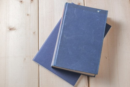 Recycled paper book on wooden background