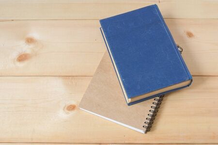 recycle notebook on wood backgroundの写真素材