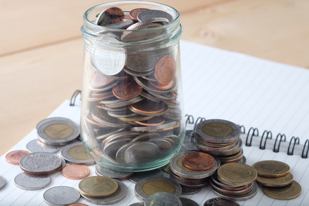 business finance. save money for investment concept money in the glass