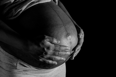 Belly of a pregnant womanの写真素材
