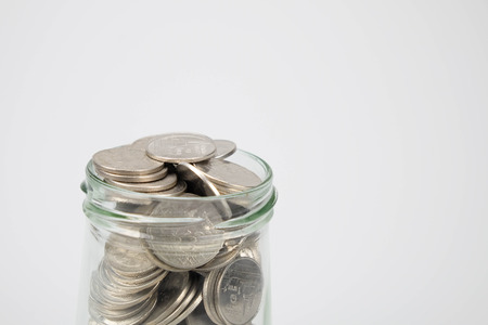 business finance. save money for investment concept money in the glass