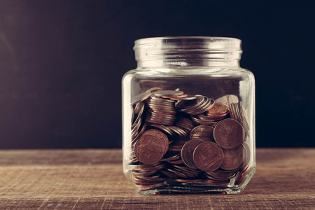 business finance. save money for investment concept money in the glass with filter effect retro...