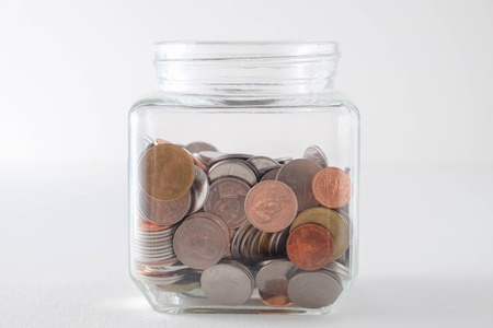 business finance. save money for investment concept money in the glass