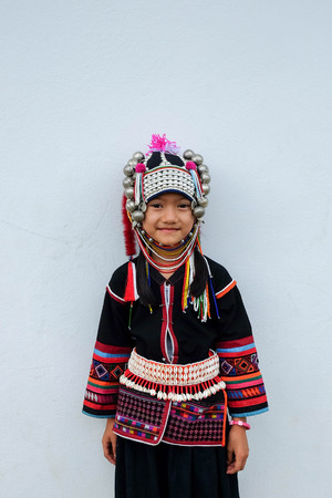 CHIANG MAI , THAILAND - June 03, 2017: Akha girl with traditional clothes and silver jewelery in akha minority villageのeditorial素材