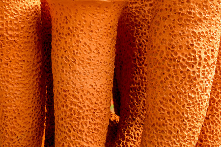 Clay ceramic background fragment with pattern and crack