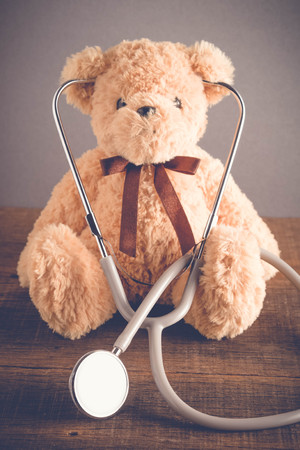 Health Care teddy bear Heart stethoscope with filter effect retro vintage styleの写真素材