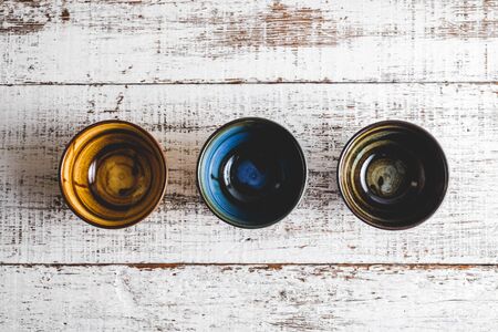 Ceramic cup molded from clay and burned with heat with filter effect retro vintage styleの写真素材