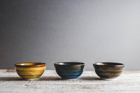 Ceramic cup molded from clay and burned with heat with filter effect retro vintage styleの写真素材