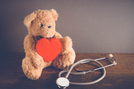 Health Care teddy bear Heart stethoscope with filter effect retro vintage styleの写真素材